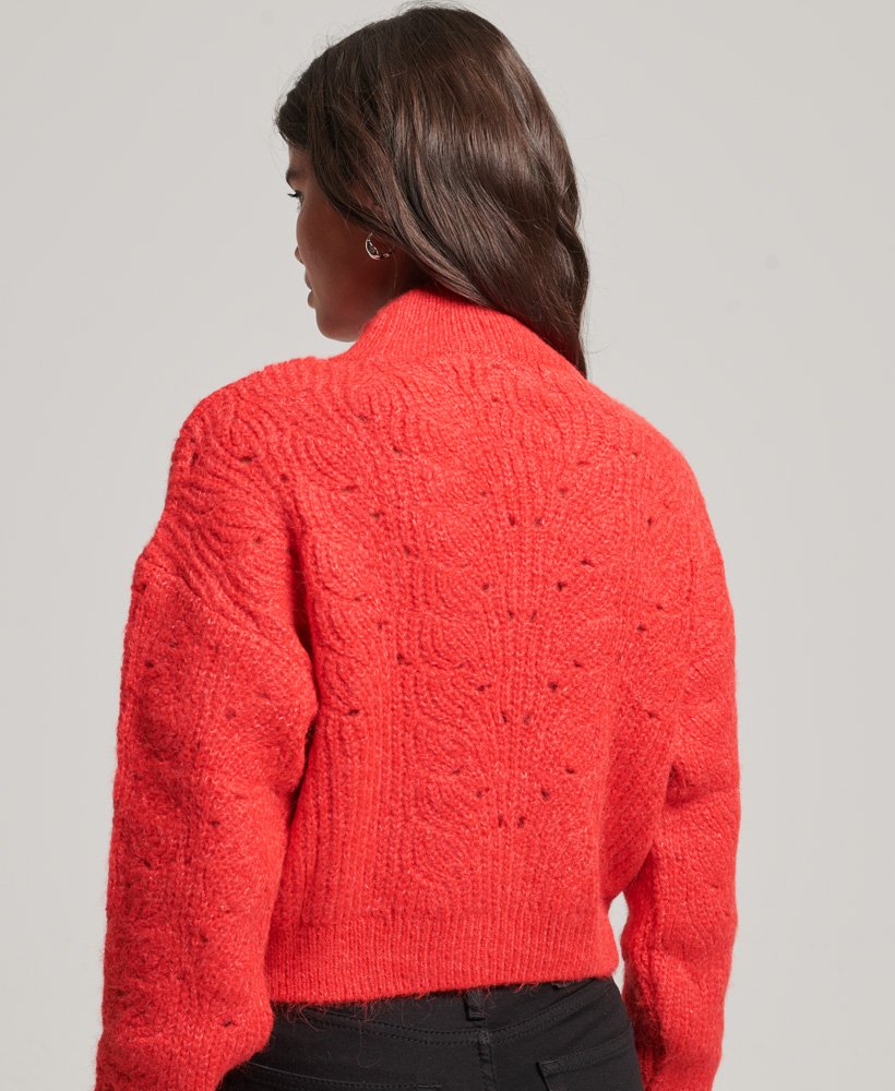 suéter de tricô com detalhes em ponto ajour na cor vermelho mesclado.