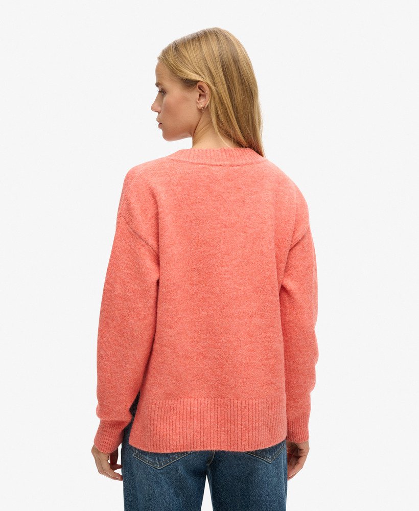 suéter oversized com decote em v na cor laranja mesclado.