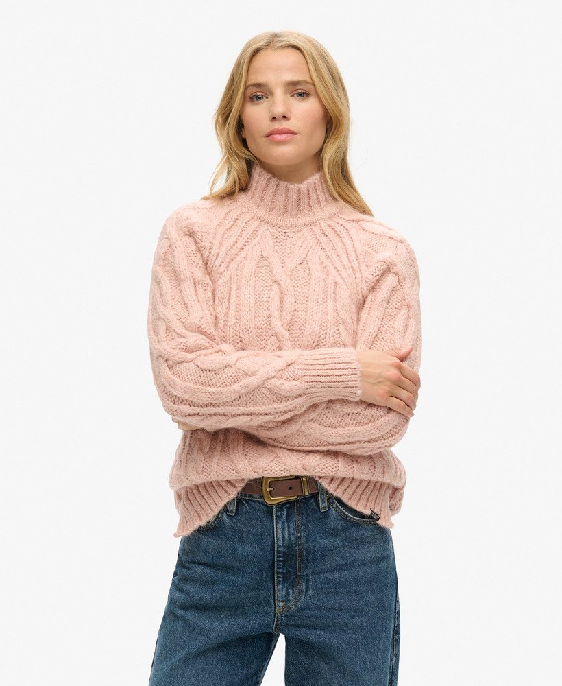 suéter de gola alta em tricô trançado na cor rosa mescla vintage blush.