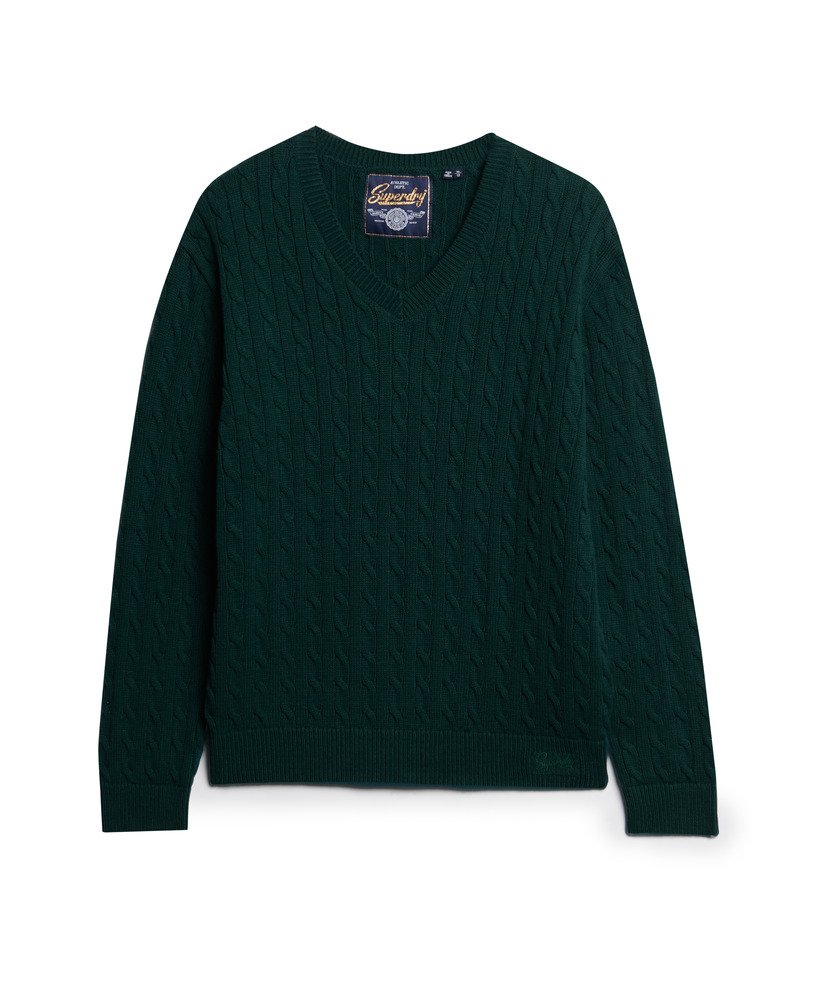 suéter oversized com decote em v e tranças na cor verde pinho escuro.