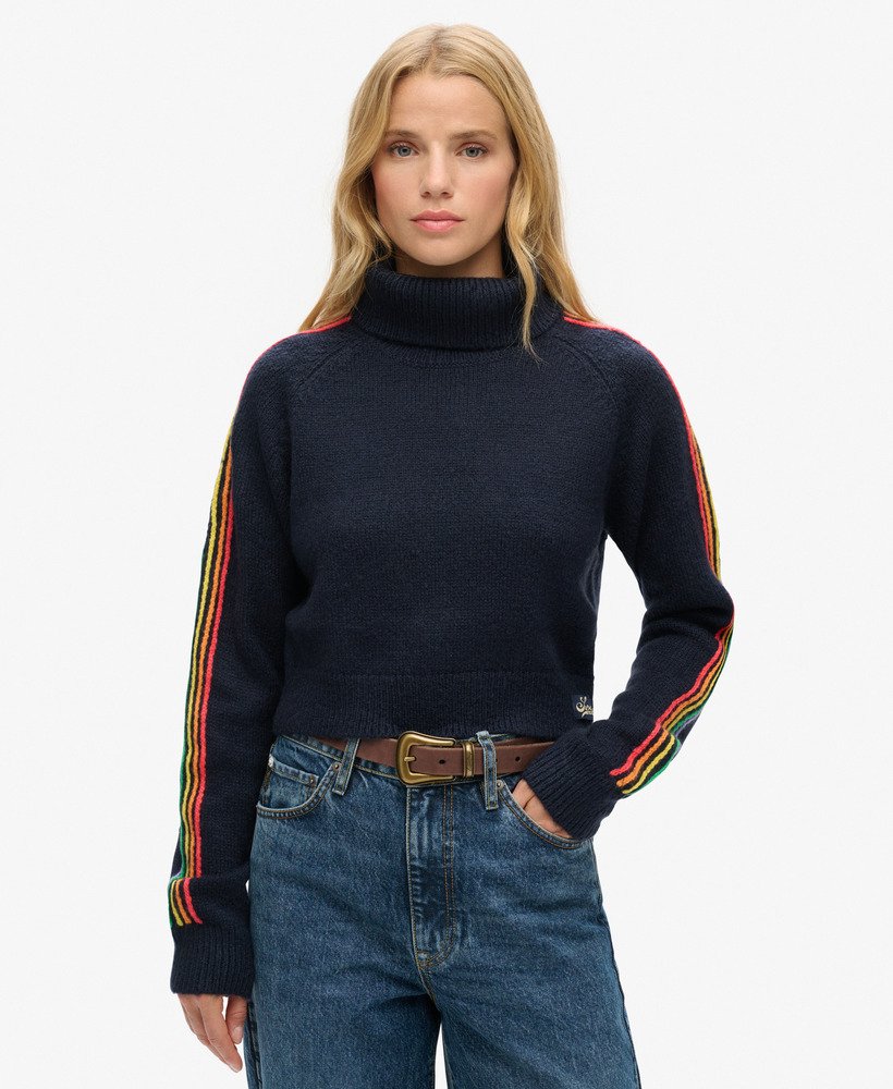 suéter gola alta raglan com listra lateral em azul marinho com listras multicoloridas