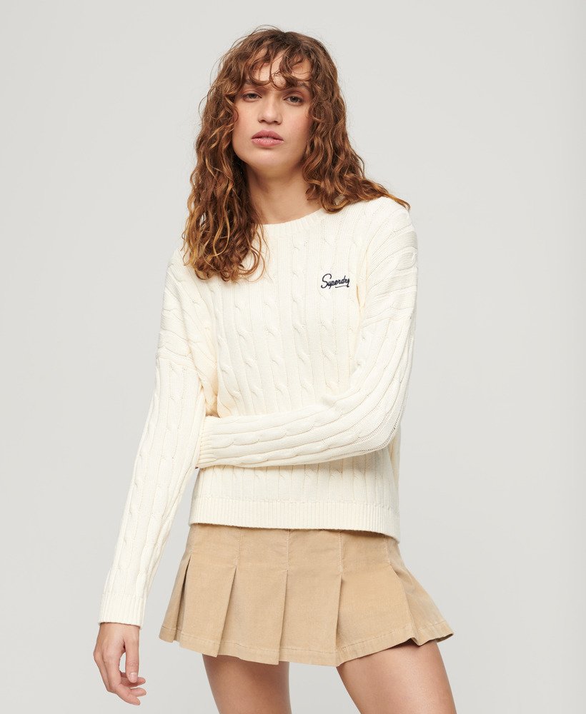 suéter vintage de tricô com ombros caídos na cor branco off-white.