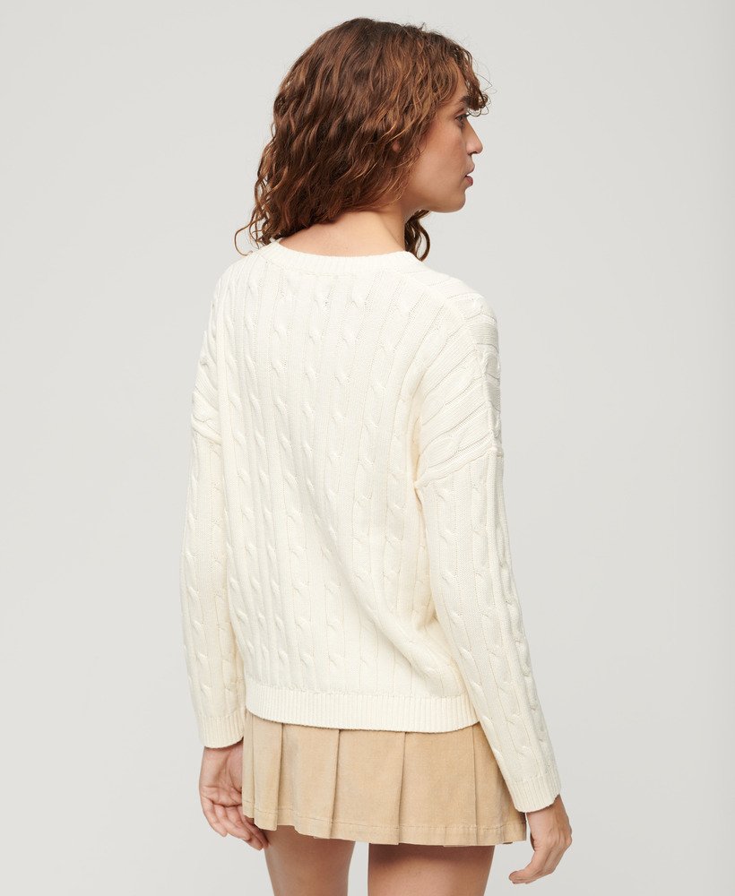 suéter vintage de tricô com ombros caídos na cor branco off-white.