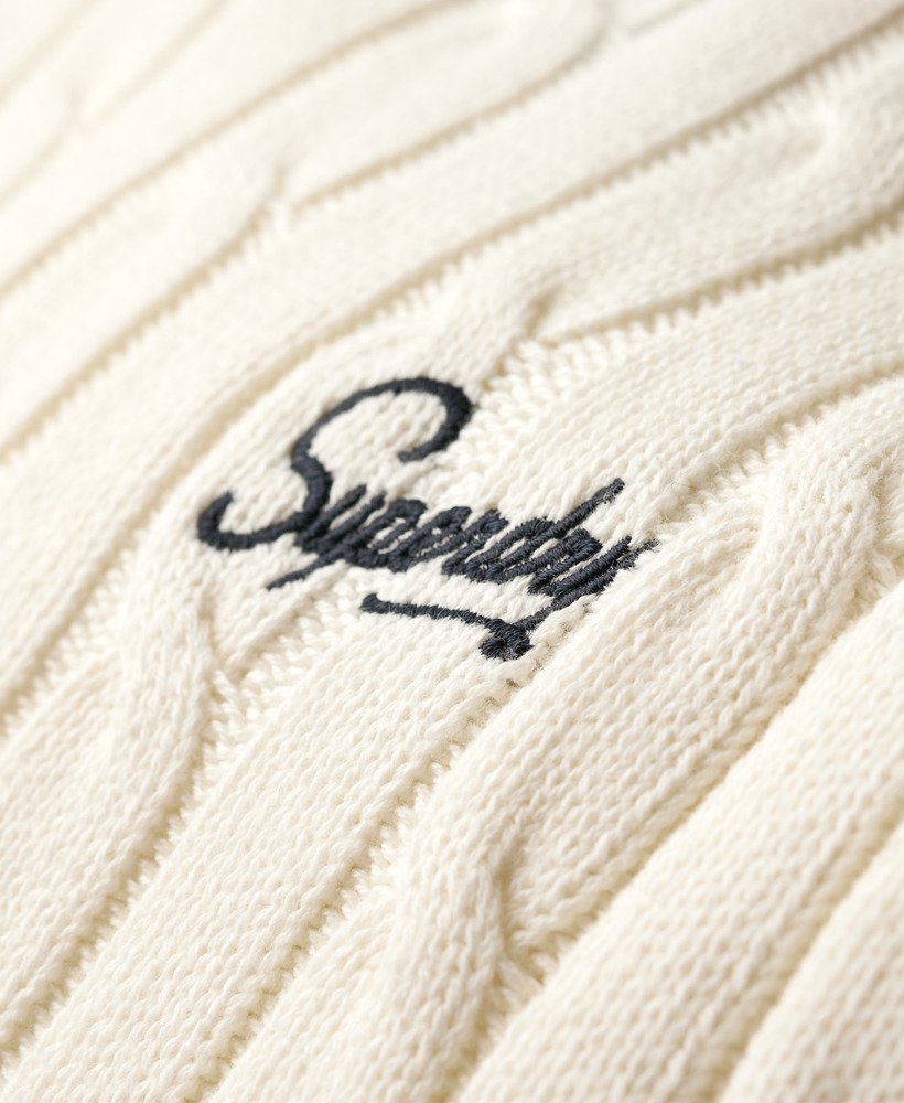 suéter vintage de tricô com ombros caídos na cor branco off-white.