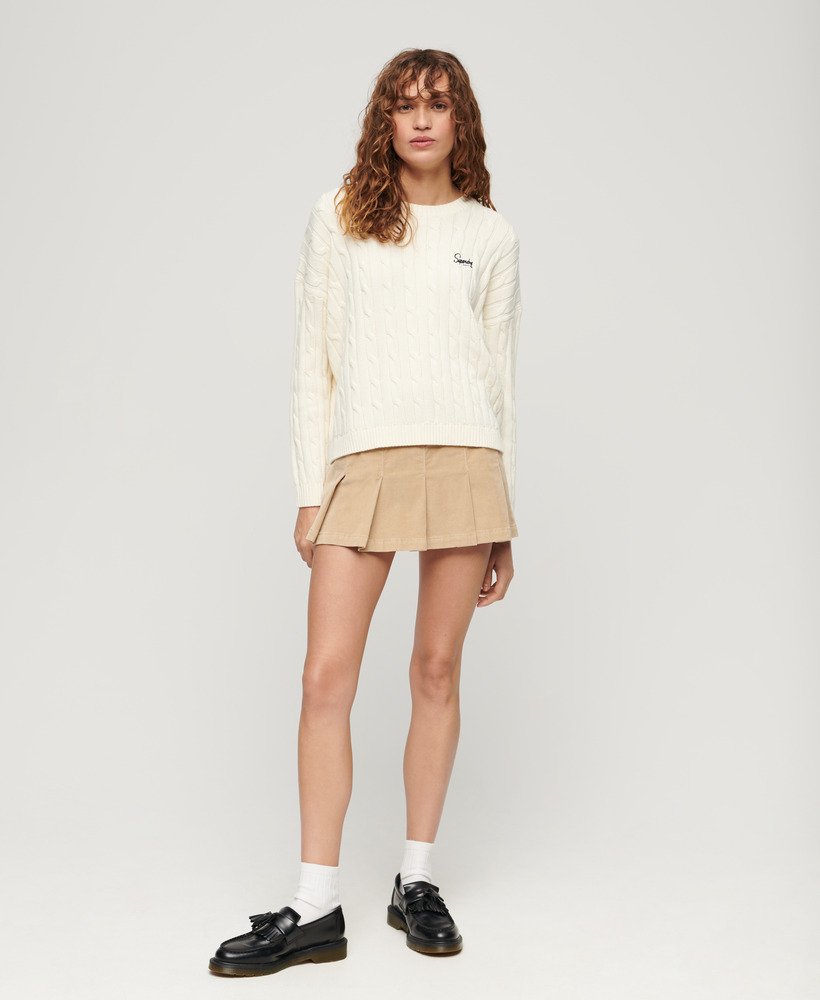 suéter vintage de tricô com ombros caídos na cor branco off-white.