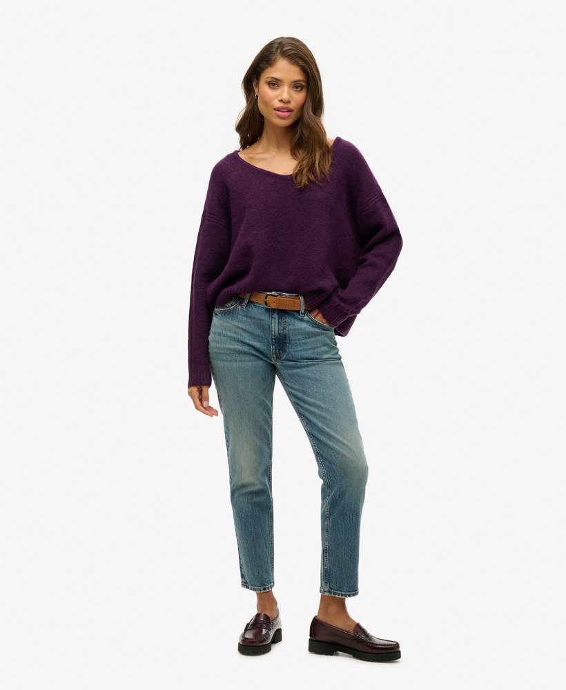 suéter oversized com decote em v na cor roxo ameixa escuro com detalhe torcido