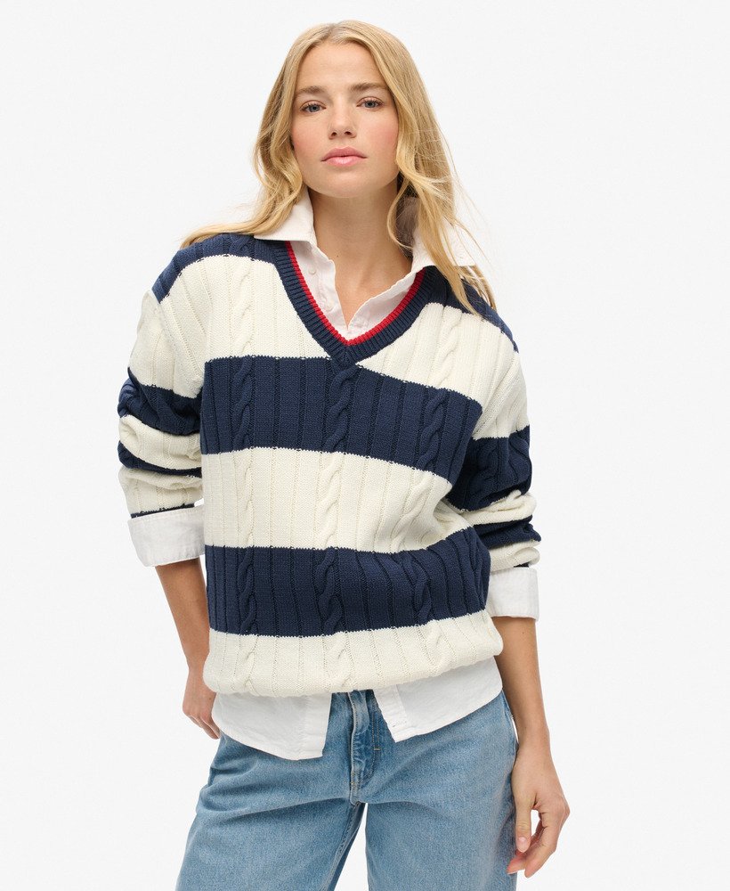 suéter oversized com decote em v e estampa de listras em azul marinho intenso.