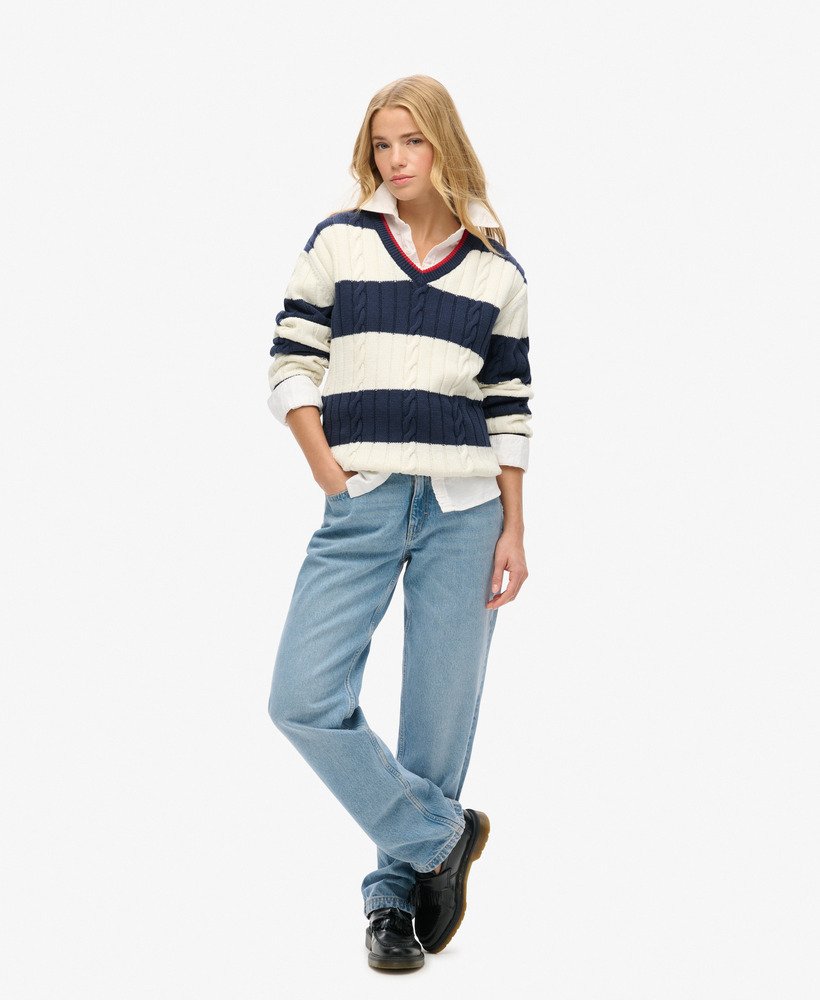 suéter oversized com decote em v e estampa de listras em azul marinho intenso.