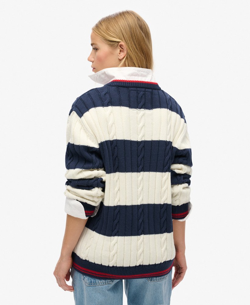 suéter oversized com decote em v e estampa de listras em azul marinho intenso.