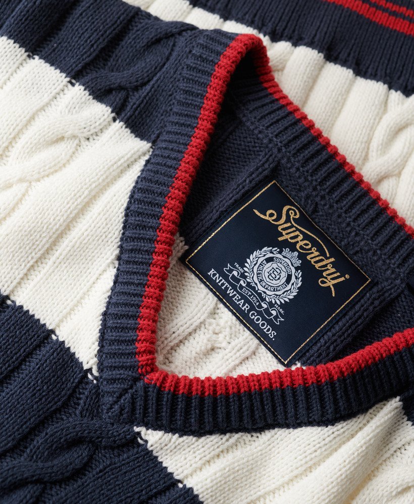 suéter oversized com decote em v e estampa de listras em azul marinho intenso.