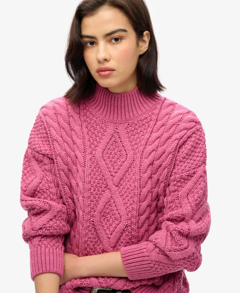 suéter polo aran com tranças na cor rosa mamão