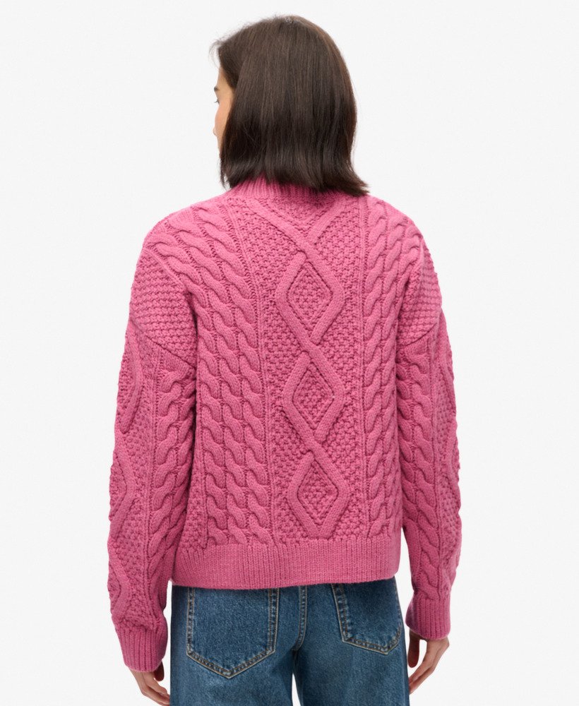suéter polo aran com tranças na cor rosa mamão
