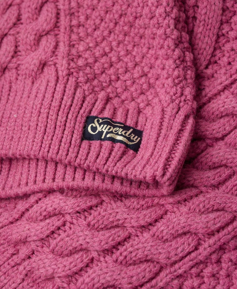 suéter polo aran com tranças na cor rosa mamão