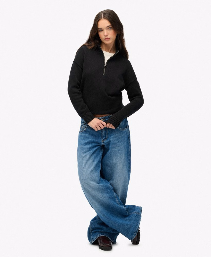 Blusa de malha folgada com meio zíper