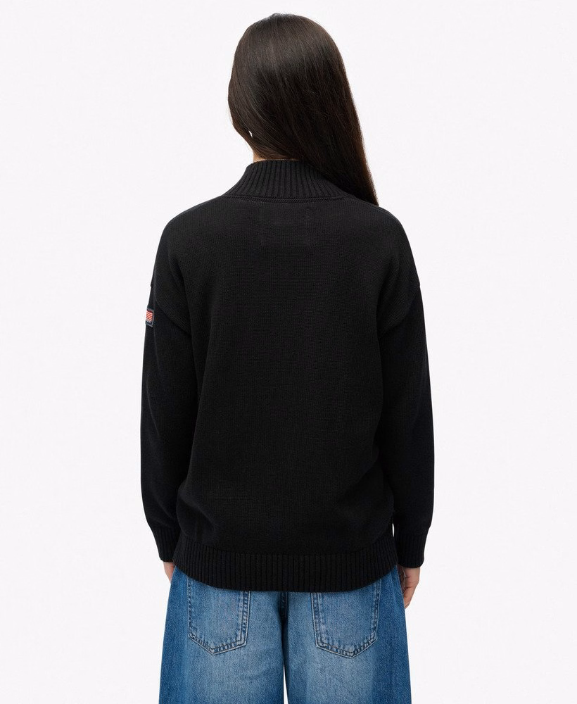 Blusa de malha folgada com meio zíper