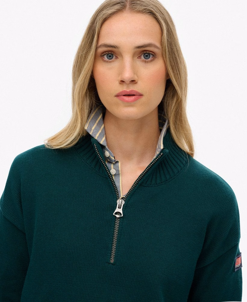 Blusa de malha folgada com meio zíper