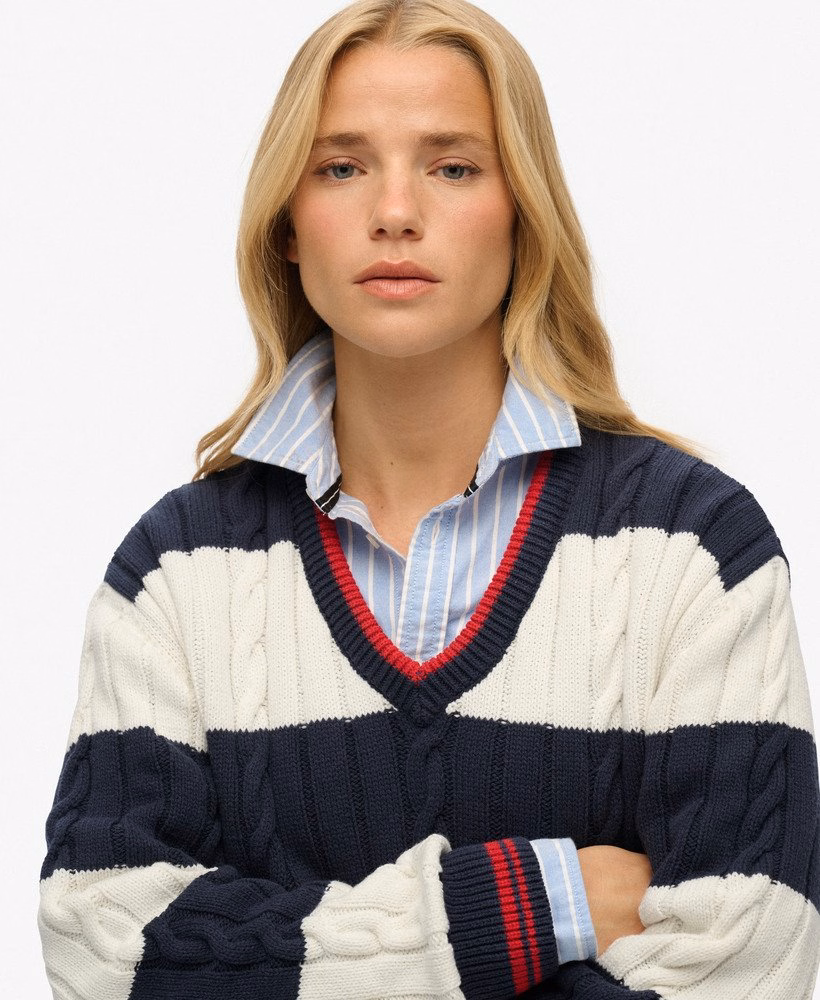 Suéter listrado oversized com decote em V e tranças