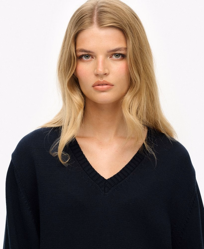 Suéter oversized listrado com decote em V
