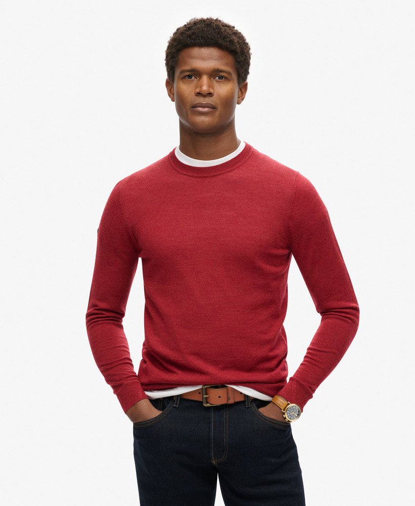 suéter de gola redonda em lã merino na cor vermelho mesclado.