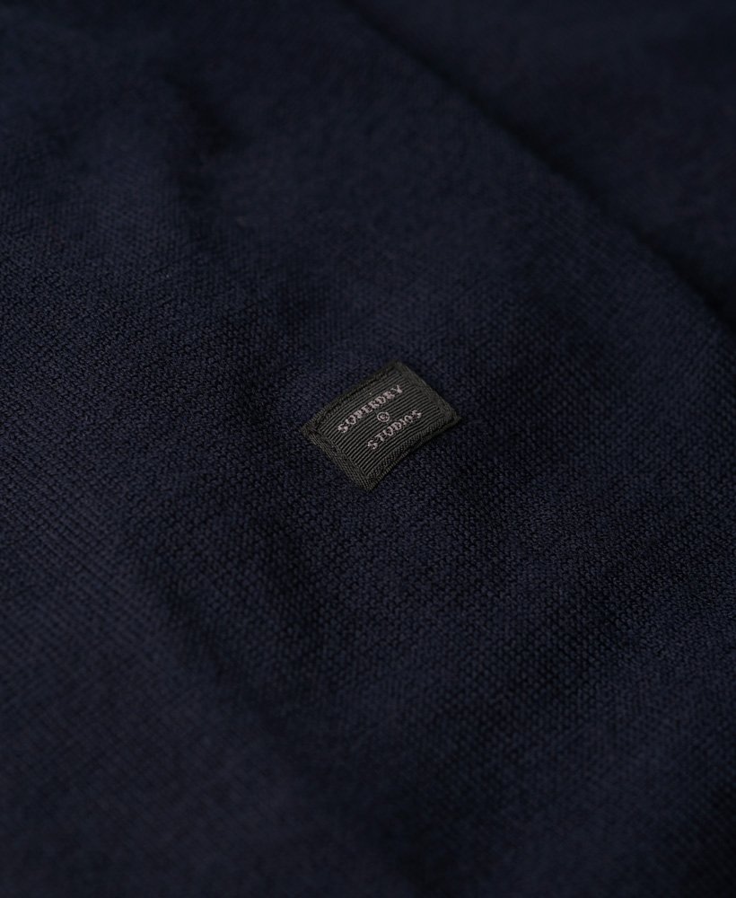 suéter de gola alta em lã merino na cor azul marinho eclipse.