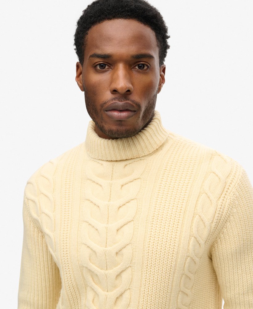 the merchant store - suéter de gola alta com tranças na cor branco off-white