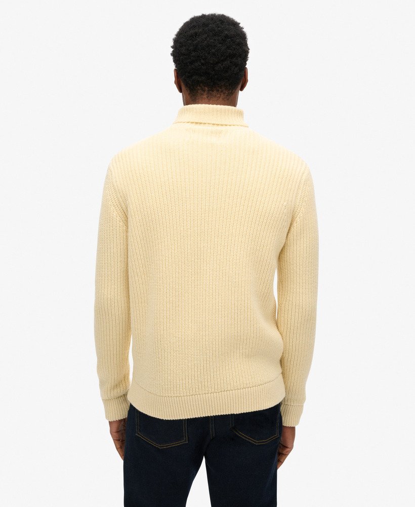 the merchant store - suéter de gola alta com tranças na cor branco off-white