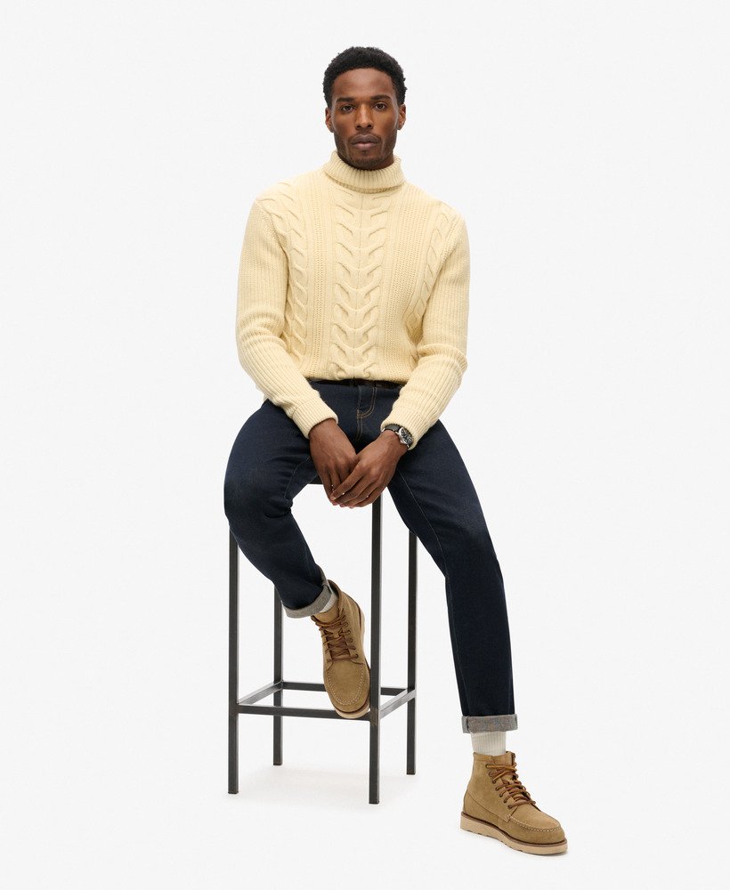 the merchant store - suéter de gola alta com tranças na cor branco off-white