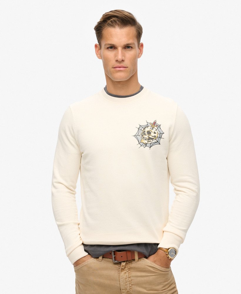 moletom com estampa de tatuagem na cor creme.