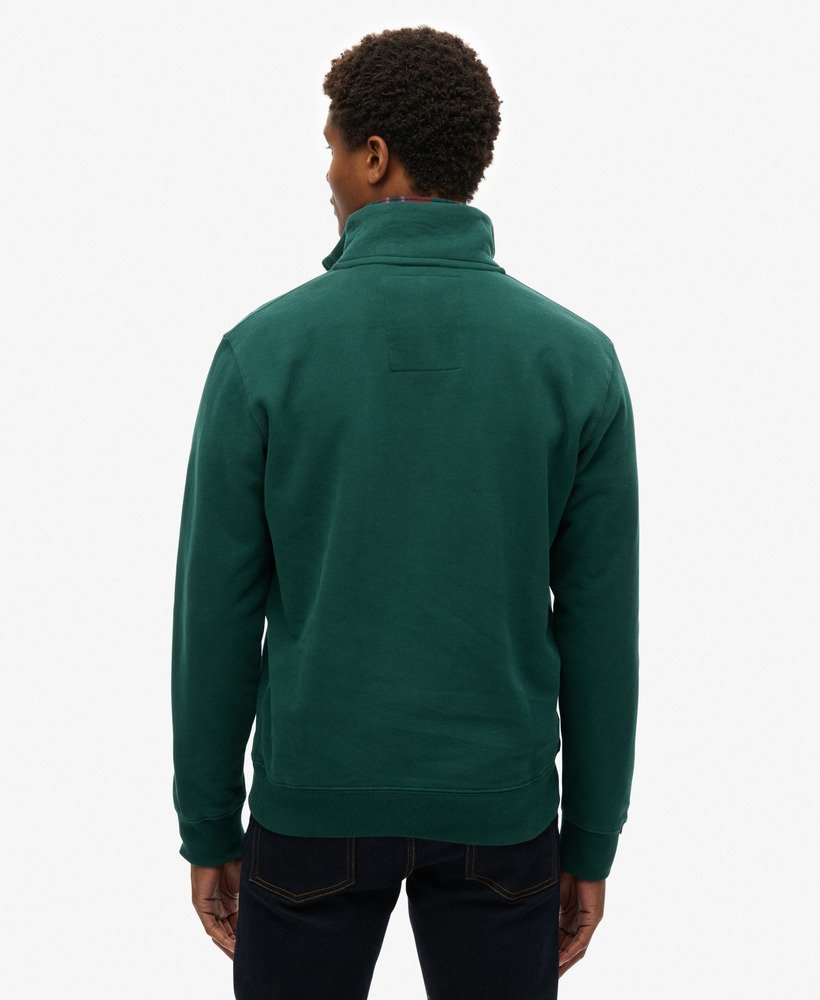 moletom essential logo com meio zíper na cor verde pinheiro escuro
