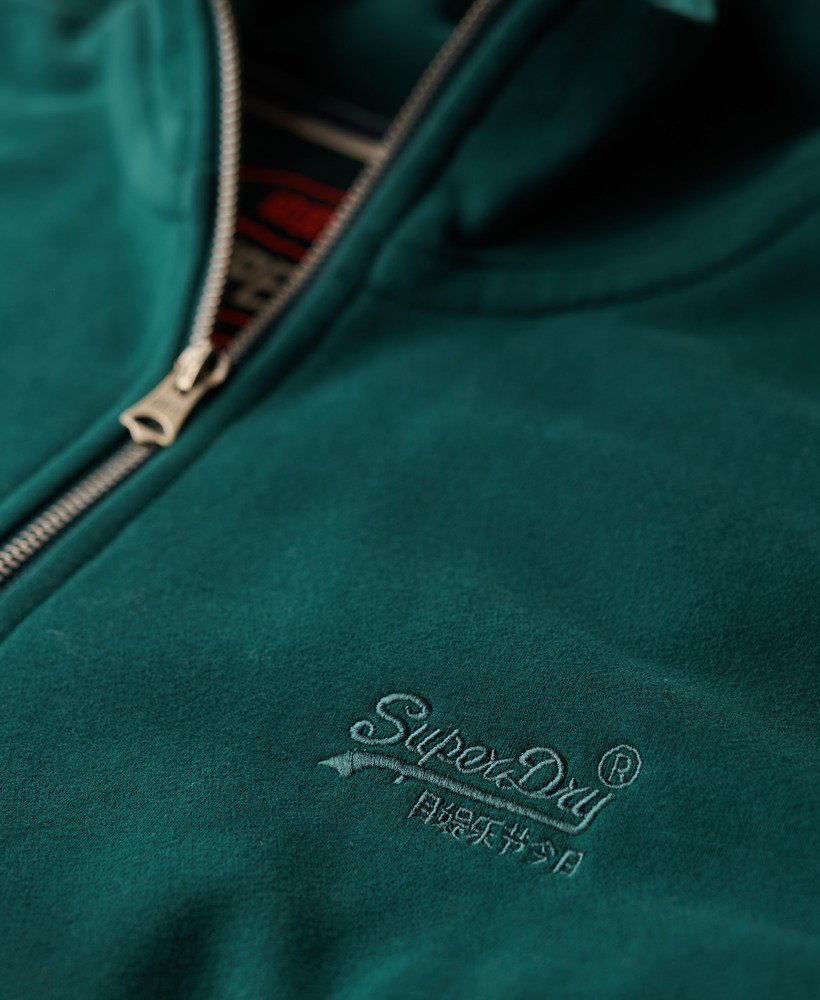 moletom essential logo com meio zíper na cor verde pinheiro escuro
