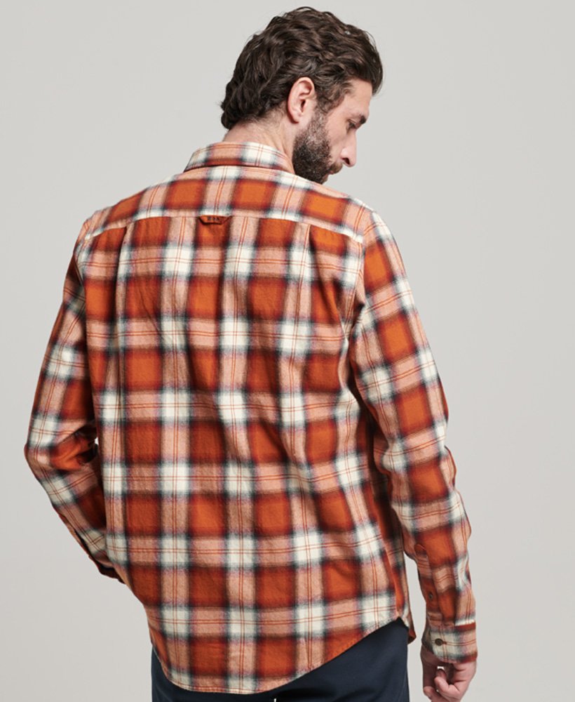camisa vintage de lenhador em algodão orgânico com estampa xadrez rodrick em tom laranja ferrugem.
