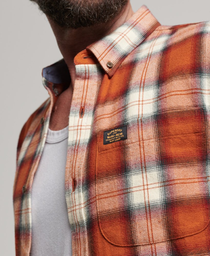 camisa vintage de lenhador em algodão orgânico com estampa xadrez rodrick em tom laranja ferrugem.