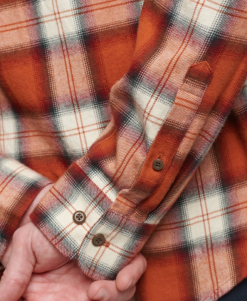 camisa vintage de lenhador em algodão orgânico com estampa xadrez rodrick em tom laranja ferrugem.