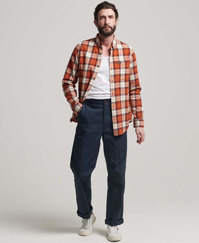 camisa vintage de lenhador em algodão orgânico com estampa xadrez rodrick em tom laranja ferrugem.