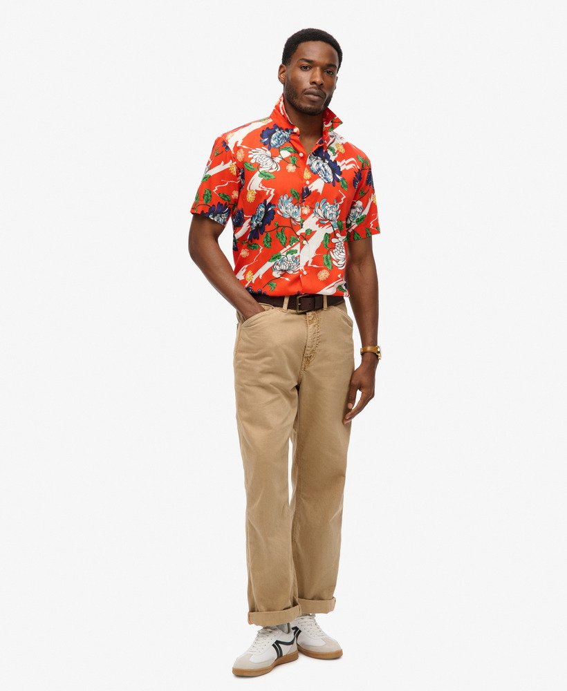 camisa havaiana de manga curta com estampa floral laranja queimado aya.