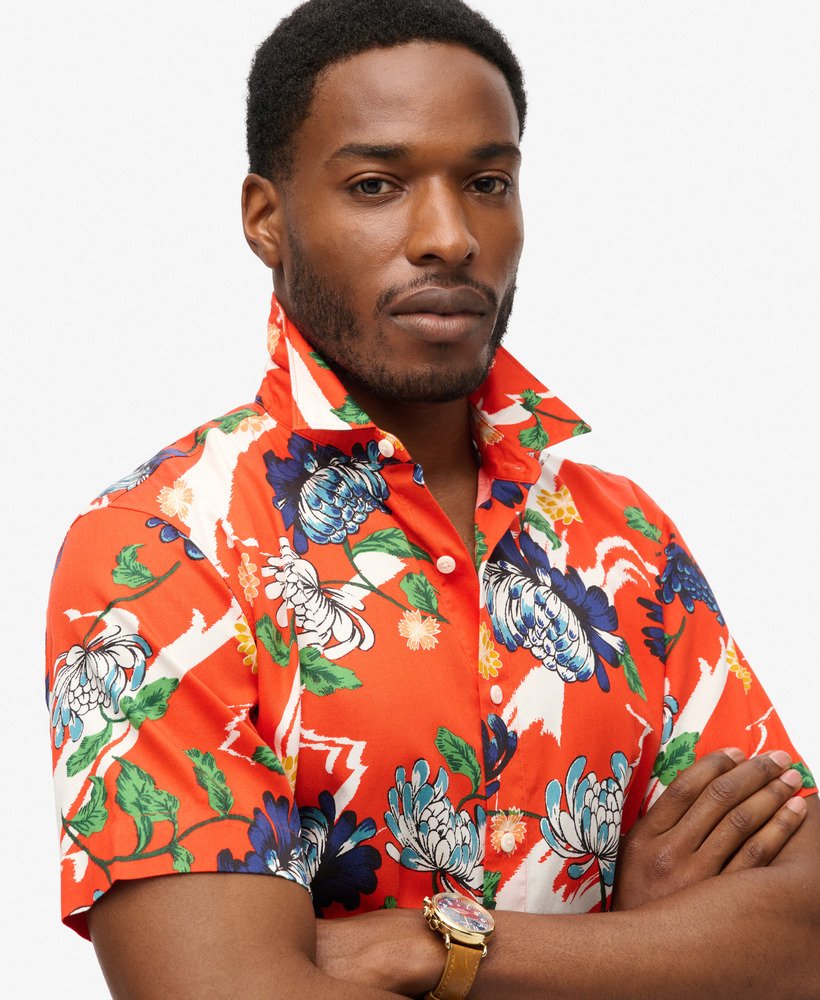 camisa havaiana de manga curta com estampa floral laranja queimado aya.