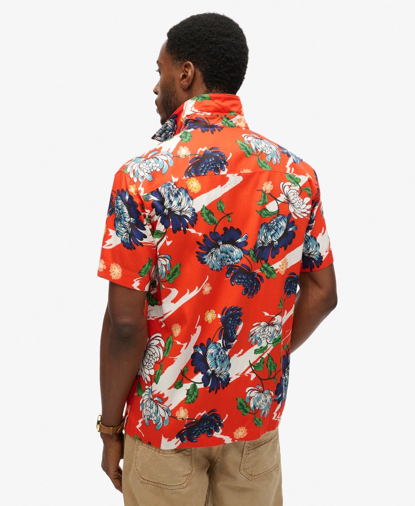camisa havaiana de manga curta com estampa floral laranja queimado aya.