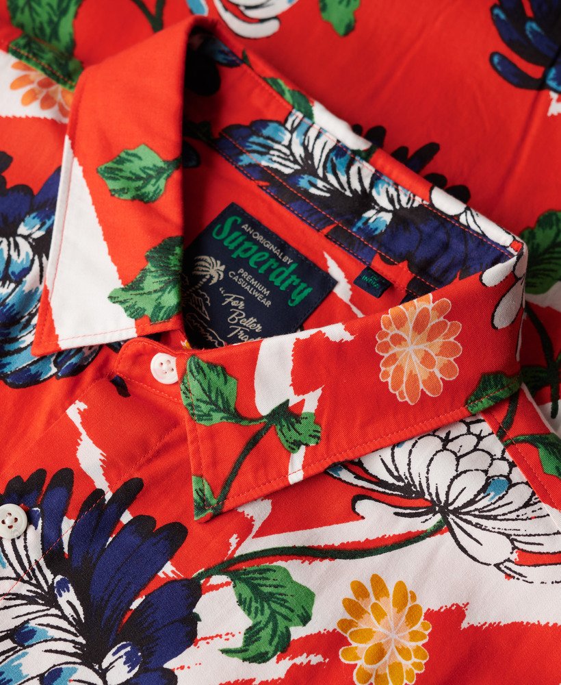 camisa havaiana de manga curta com estampa floral laranja queimado aya.