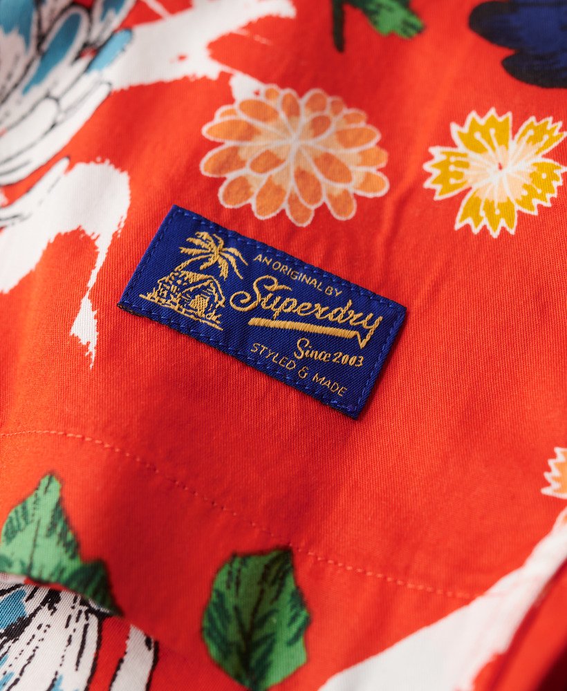 camisa havaiana de manga curta com estampa floral laranja queimado aya.
