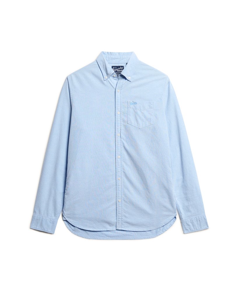 camisa oxford de manga comprida na cor azul clássica.