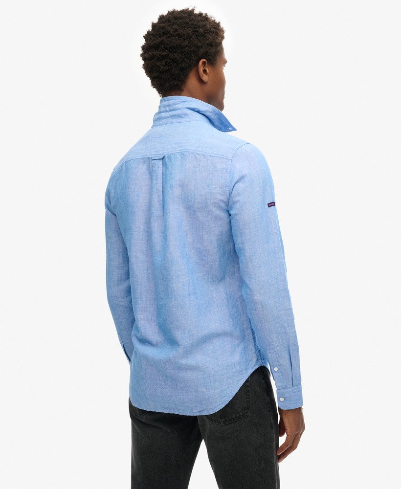 camisa de linho com botões da organic cotton studios na cor blue bonnet.