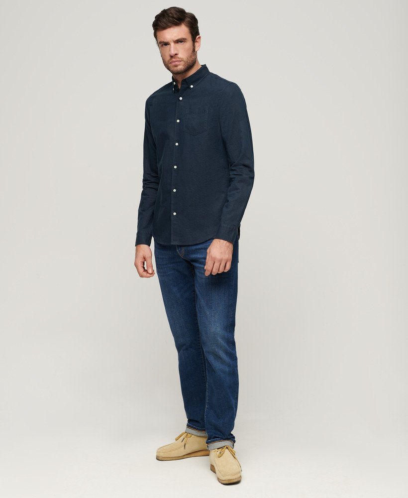 camisa de linho com botões da organic cotton studios na cor azul marinho eclipse.
