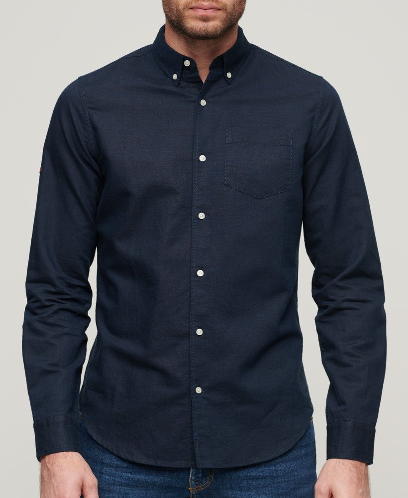 camisa de linho com botões da organic cotton studios na cor azul marinho eclipse.
