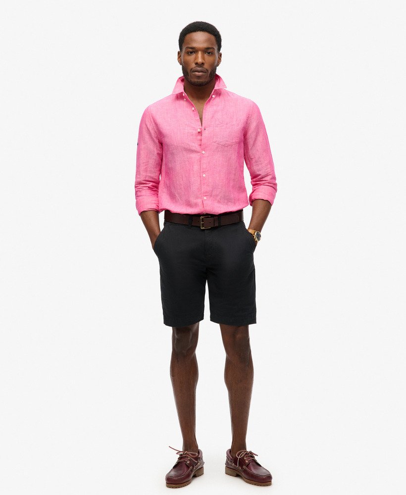 camisa de linho com botões da organic cotton studios na cor rosa vibrante.