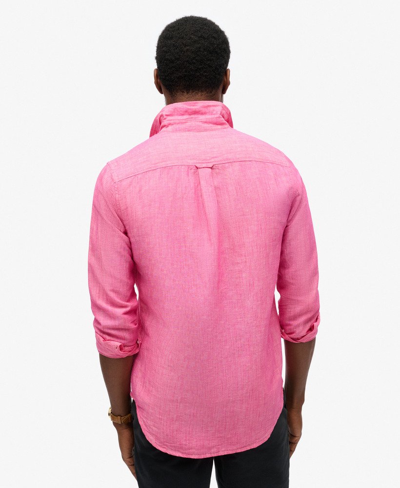 camisa de linho com botões da organic cotton studios na cor rosa vibrante.