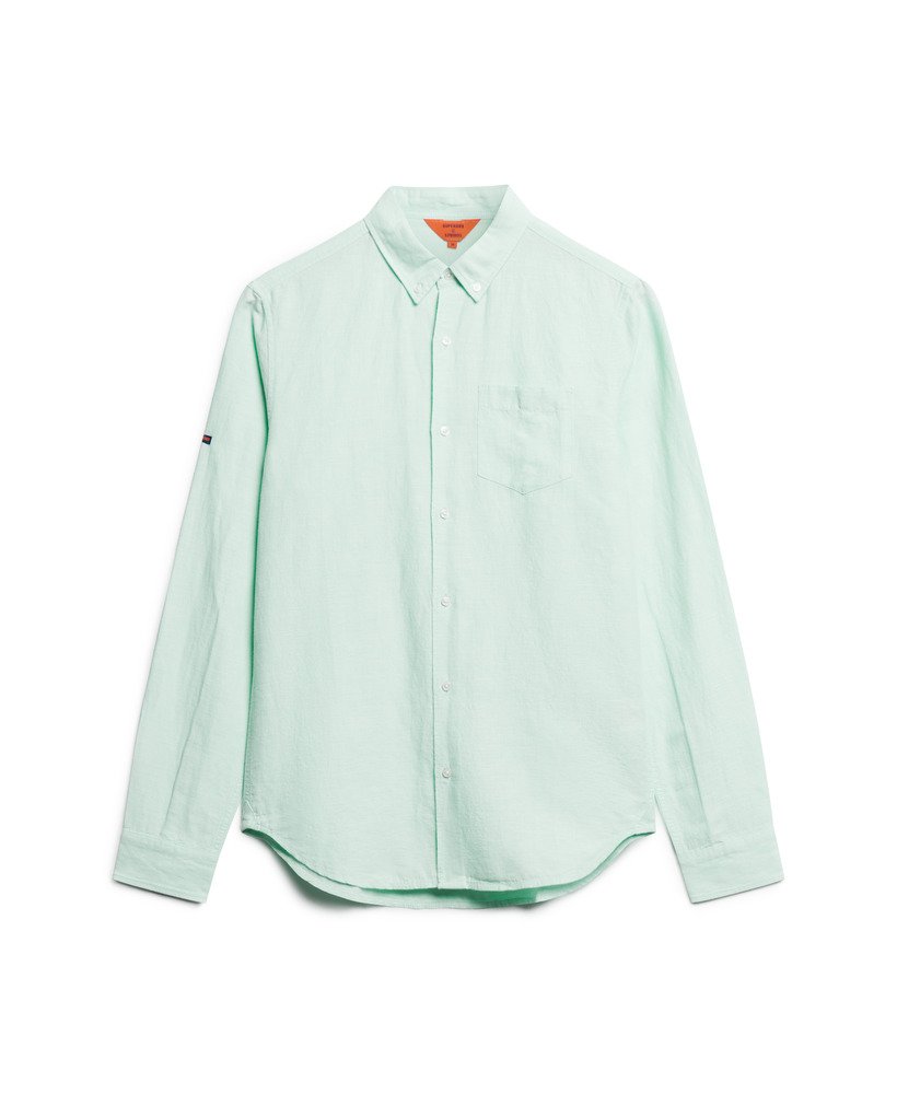 camisa de linho com botões da organic cotton studios na cor azul pluma.