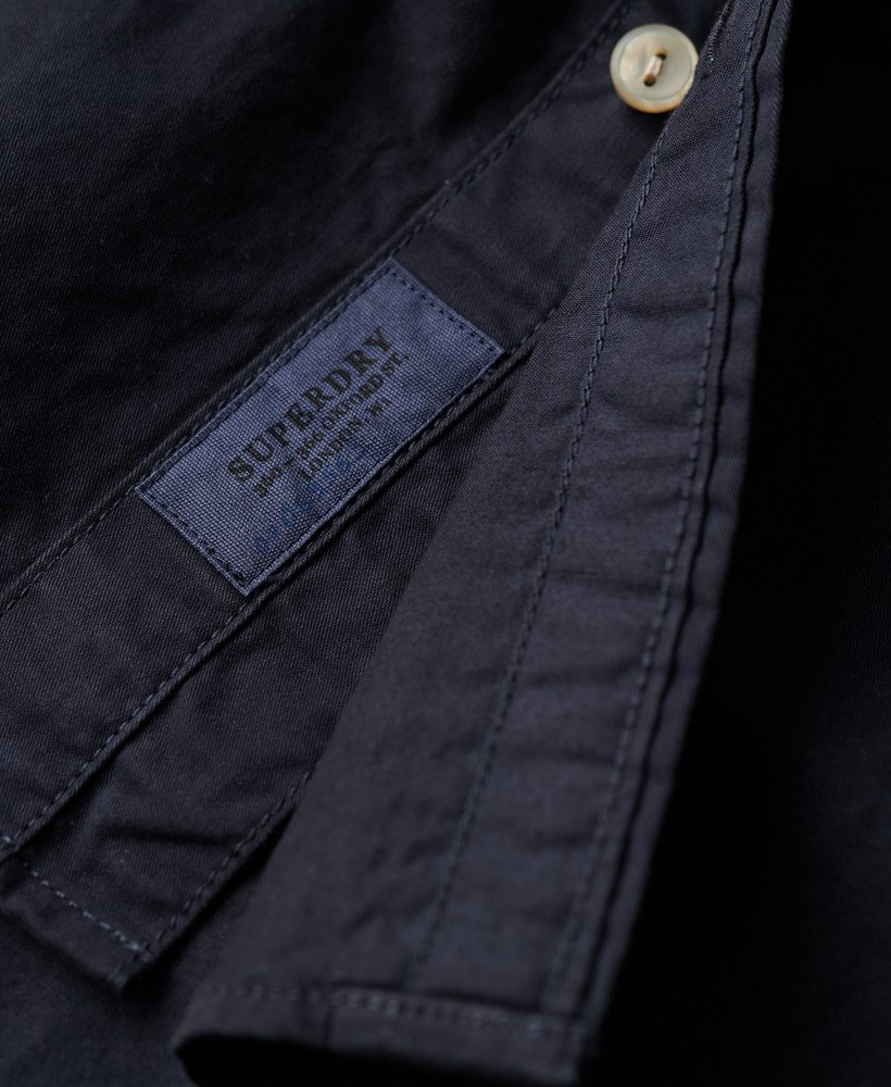 camisa de manga comprida da the merchant store na cor azul marinho eclipse.
