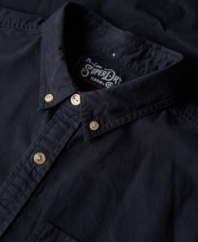 camisa de manga comprida da the merchant store na cor azul marinho eclipse.