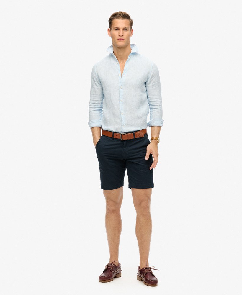 camisa casual de linho de manga comprida com listras azul-marinho.