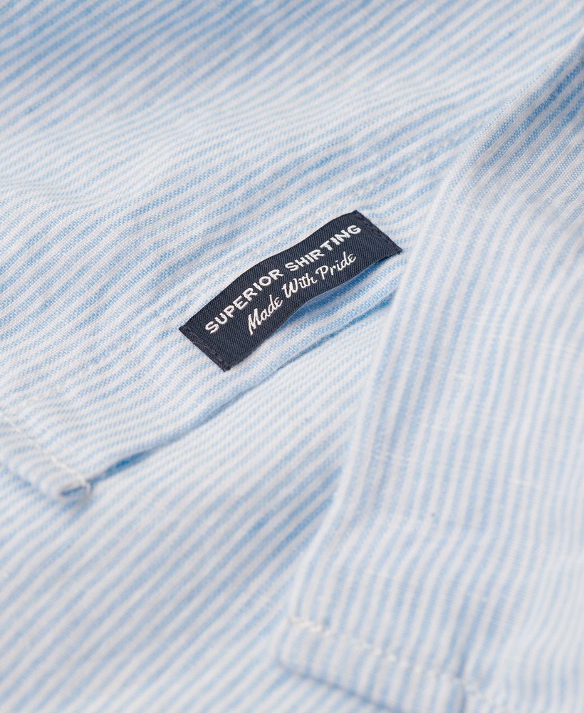 camisa casual de linho de manga comprida com listras azul-marinho.
